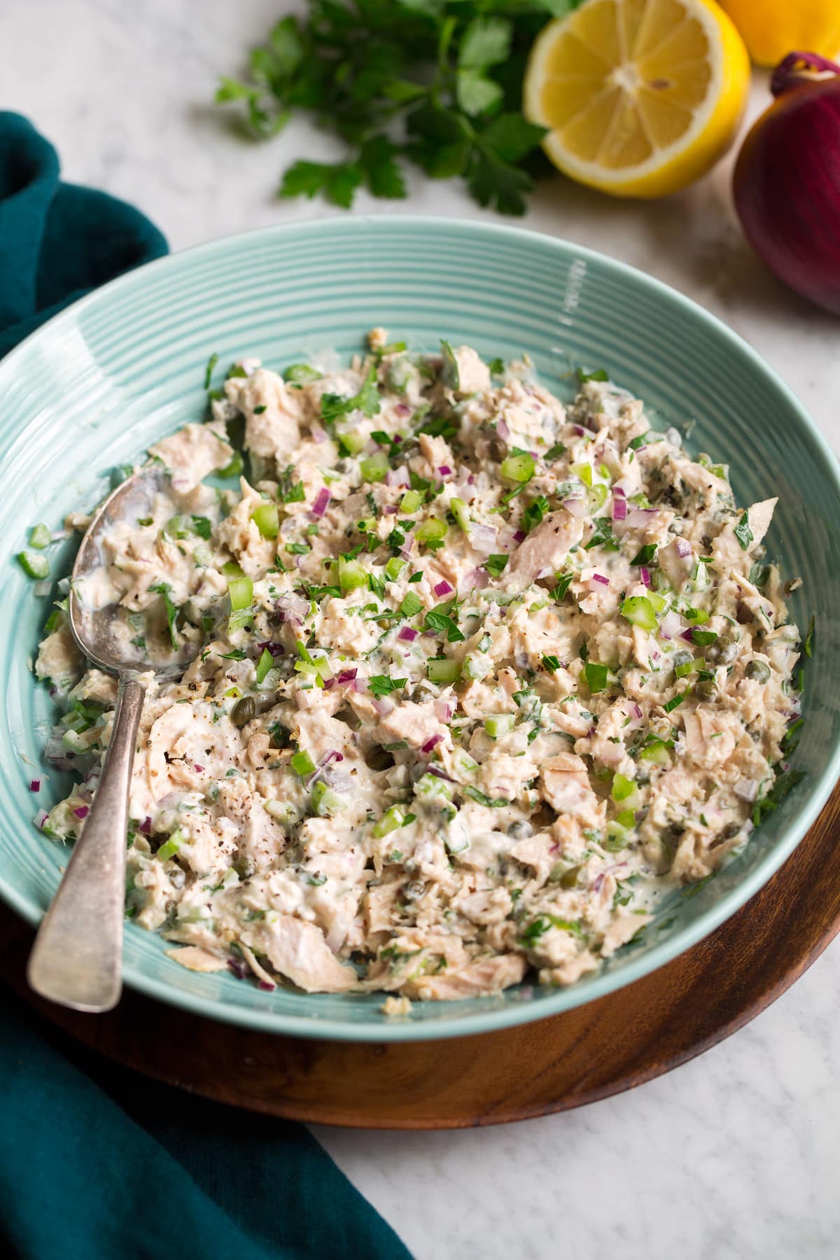 Tuna salad in a turquoise serving bowl.