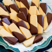 Rectangular shortbread cookies shown on a plate at a side angle.