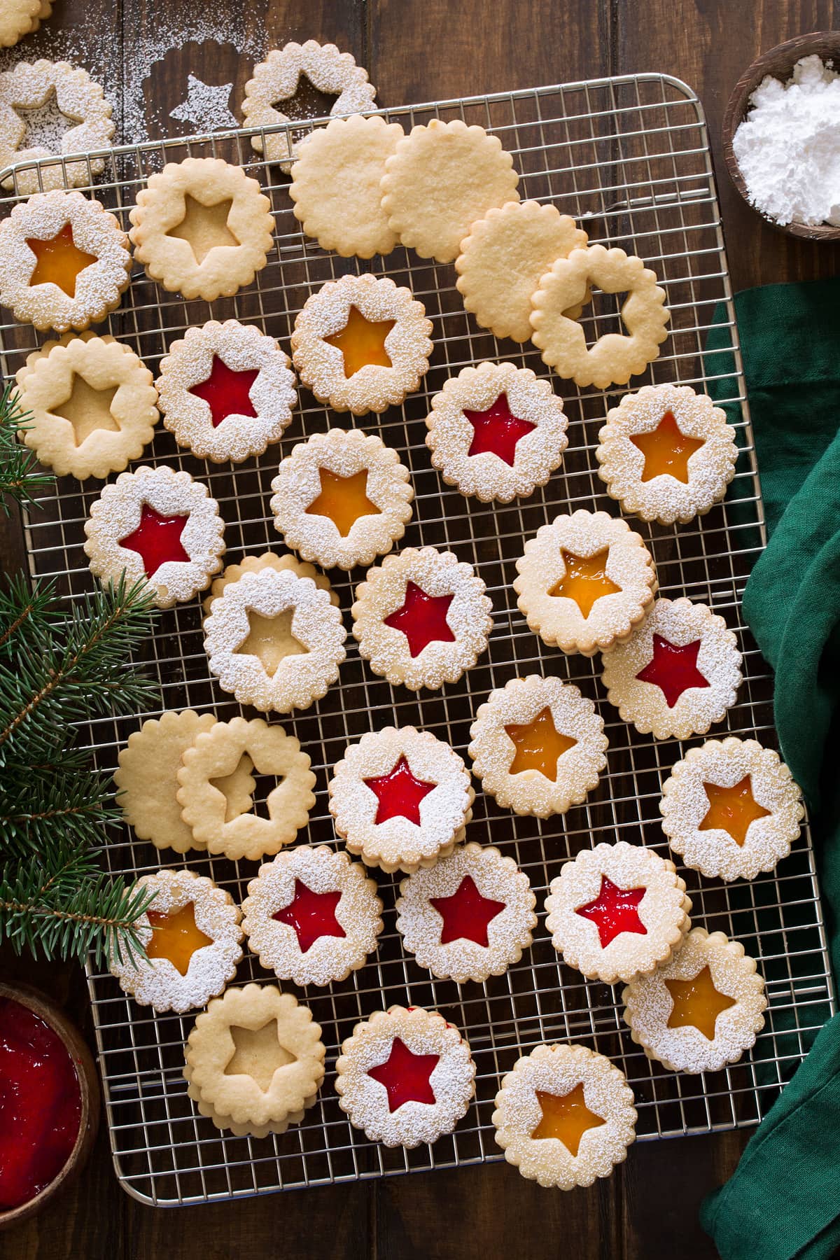 Linzer cookies on a wire cooling rack.