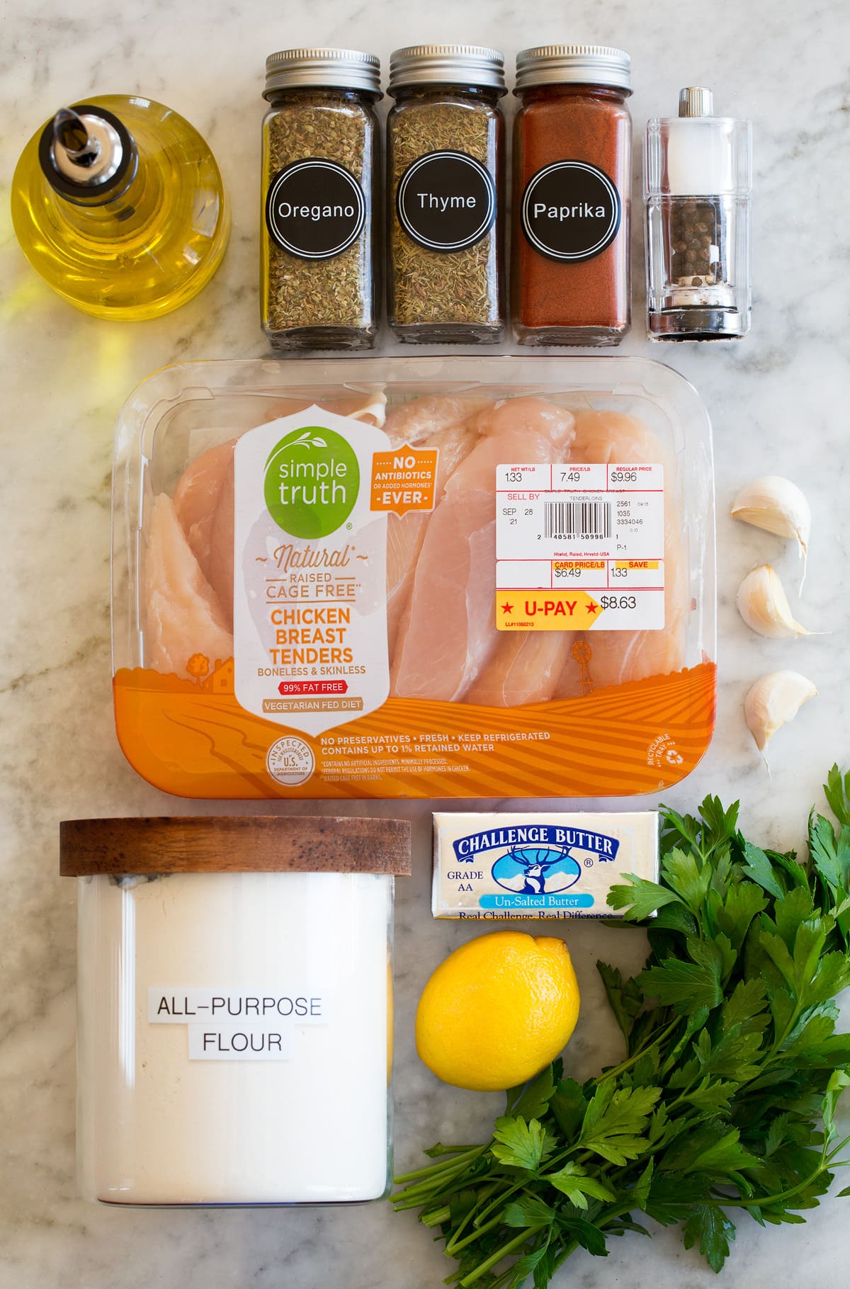 Photo of ingredients used to make pan seared chicken tenders with lemon, garlic and butter.