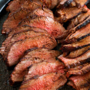 Close up photo of thinly sliced roasted tri tip.
