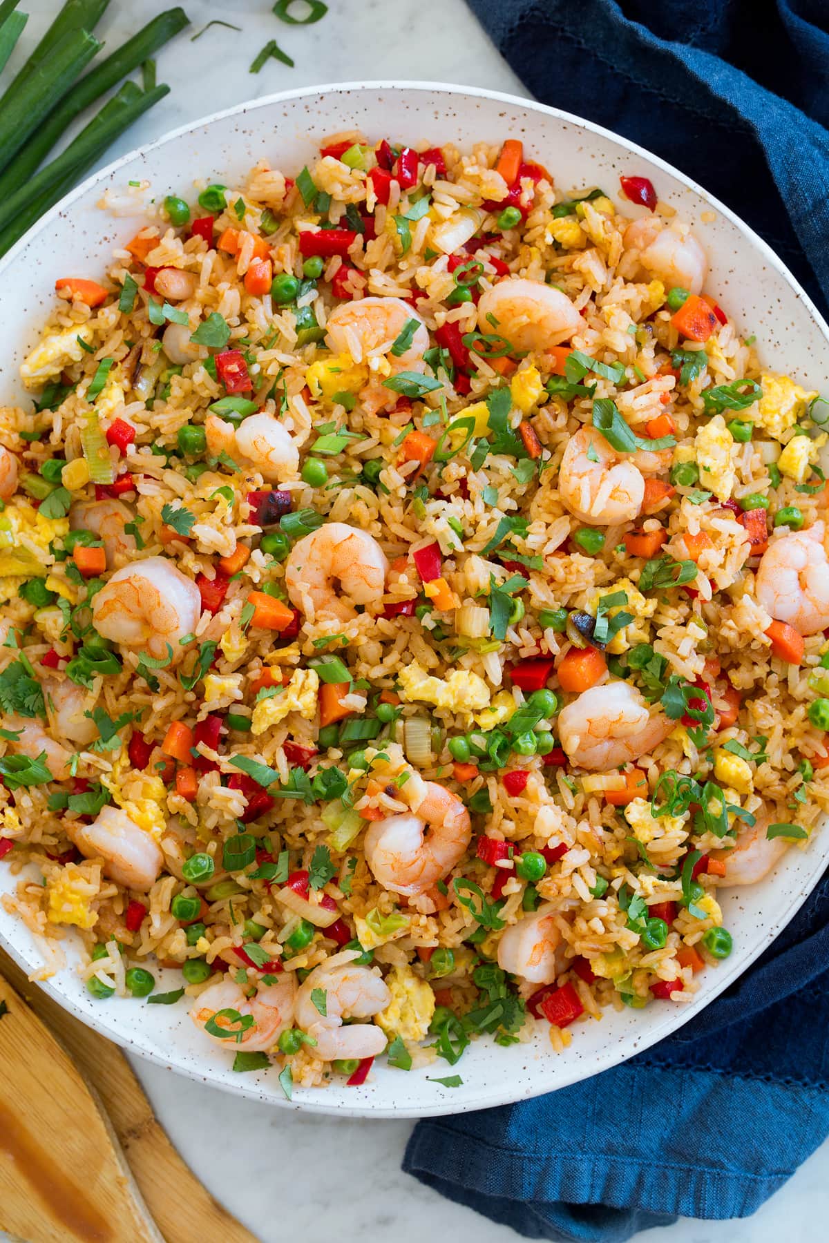 Bowl full of shrimp fried rice shown from above.