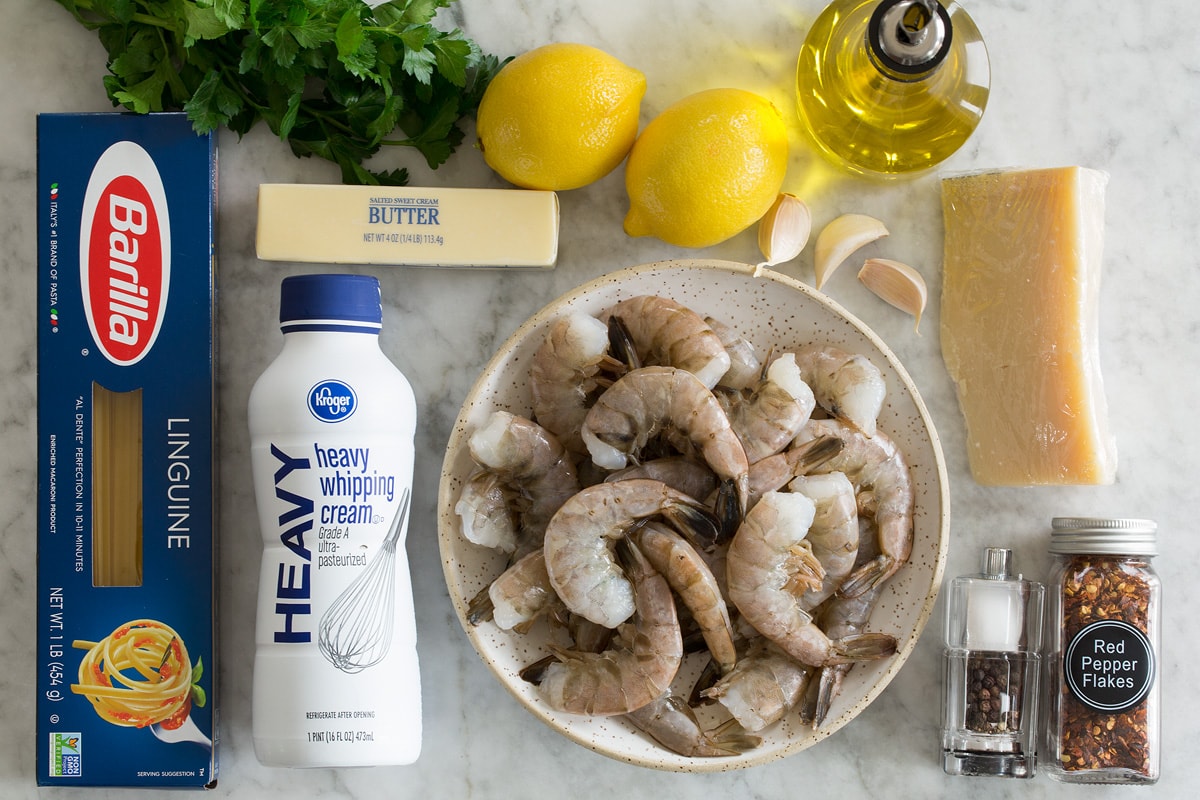 Ingredients needed to make lemon shrimp pasta.