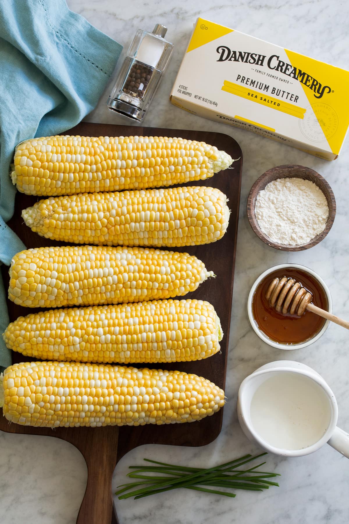 Ingredients needed to make homemade creamed corn.