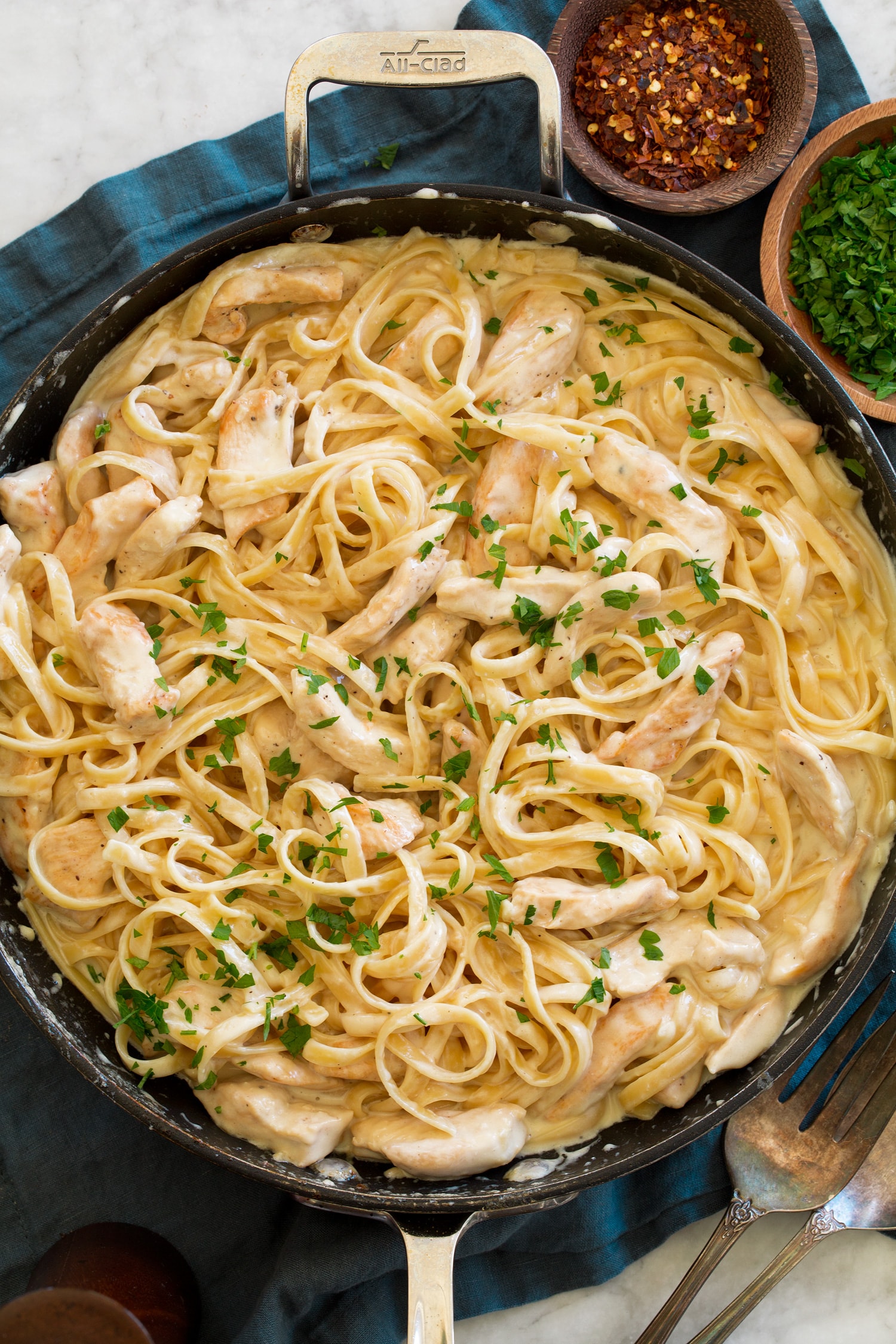 Chicken alfredo in a large skillet.