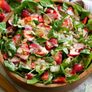 Homemade strawberry spinach salad with easy poppy seed dressing.