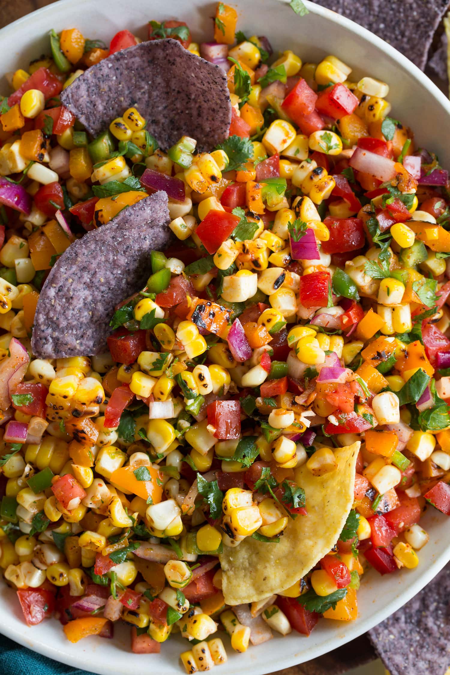 Close up photo of salsa with corn ingredients.