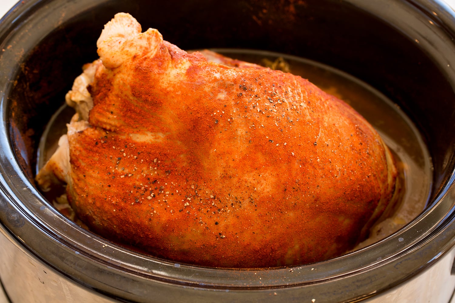 Finished seasoned turkey breast in crockpot.