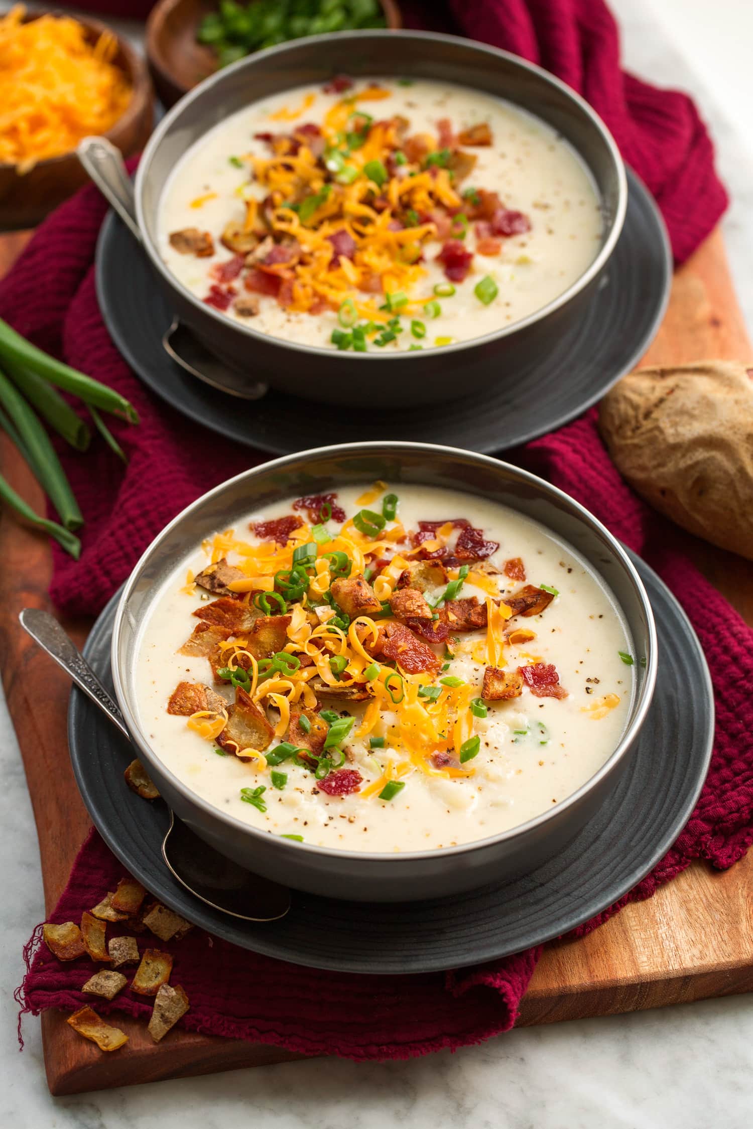 Two servings of baked potato soup.