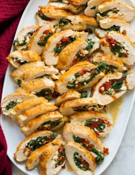 Stuffed chicken breasts with spinach, feta, mozzarella, and sun dried tomatoes.