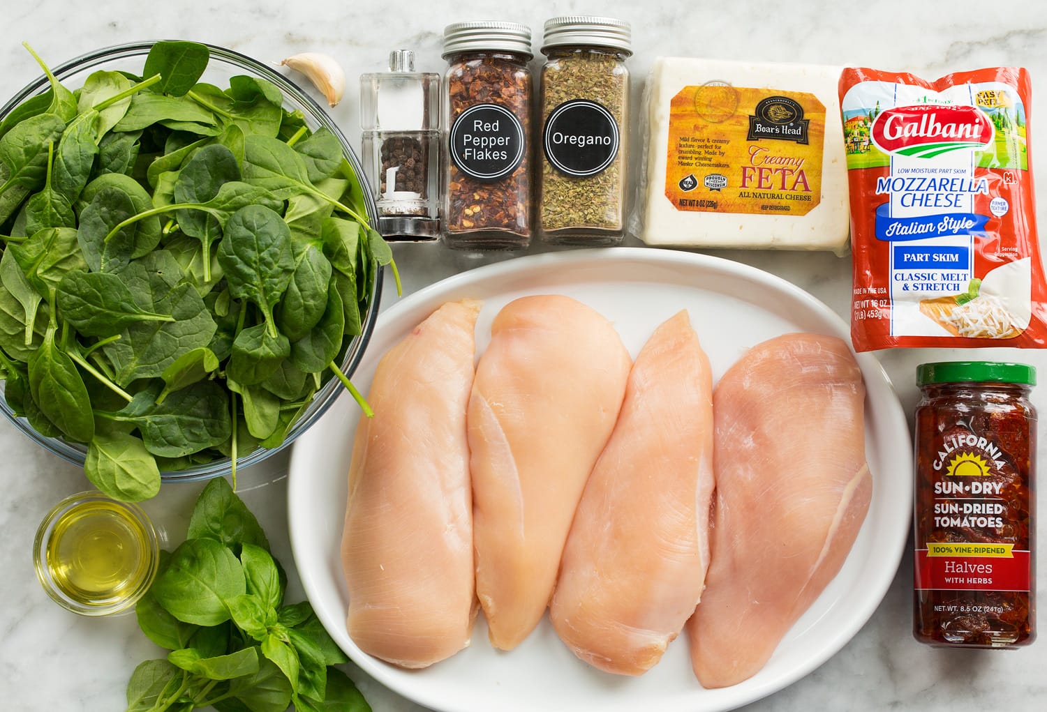 Ingredients used to make spinach stuffed chicken.