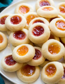 Homemade thumbprint cookies filled with raspberry, strawberry and apricot jam.