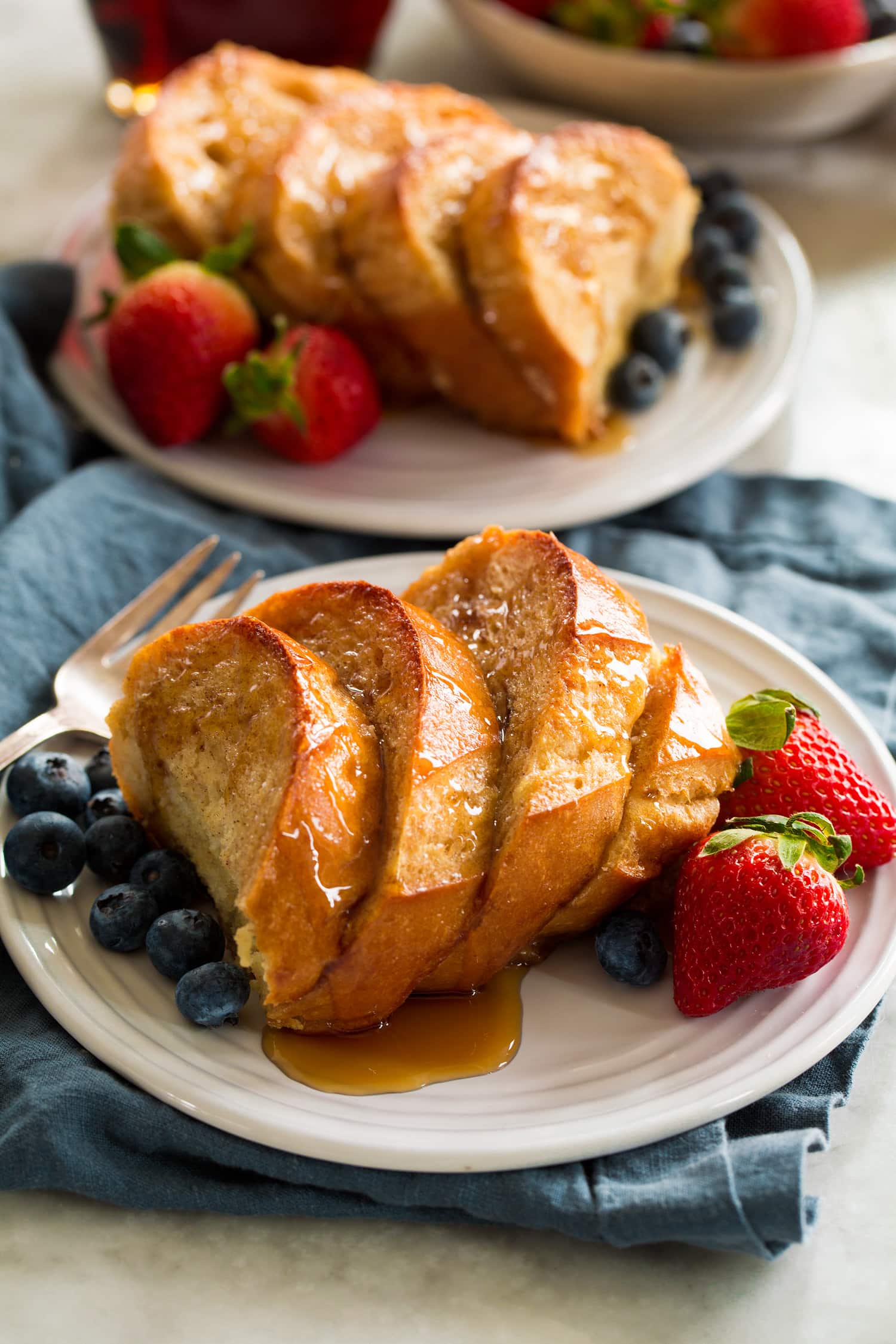 Baked french toast cut into square servings.