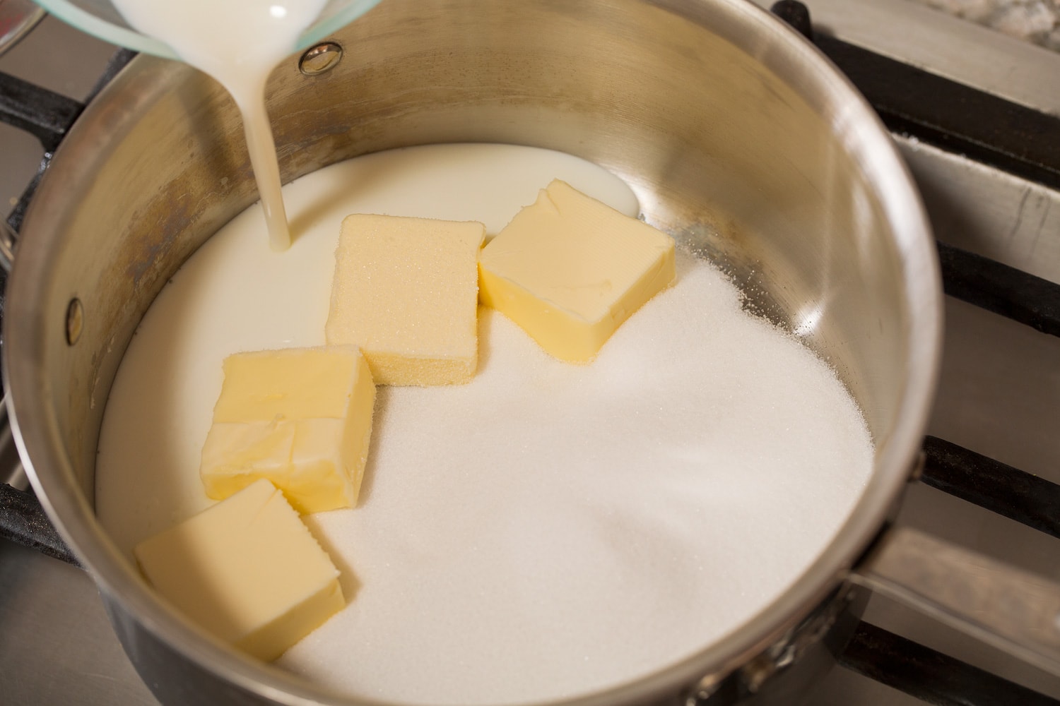 Sugar, butter, and buttermilk in a saucepan.