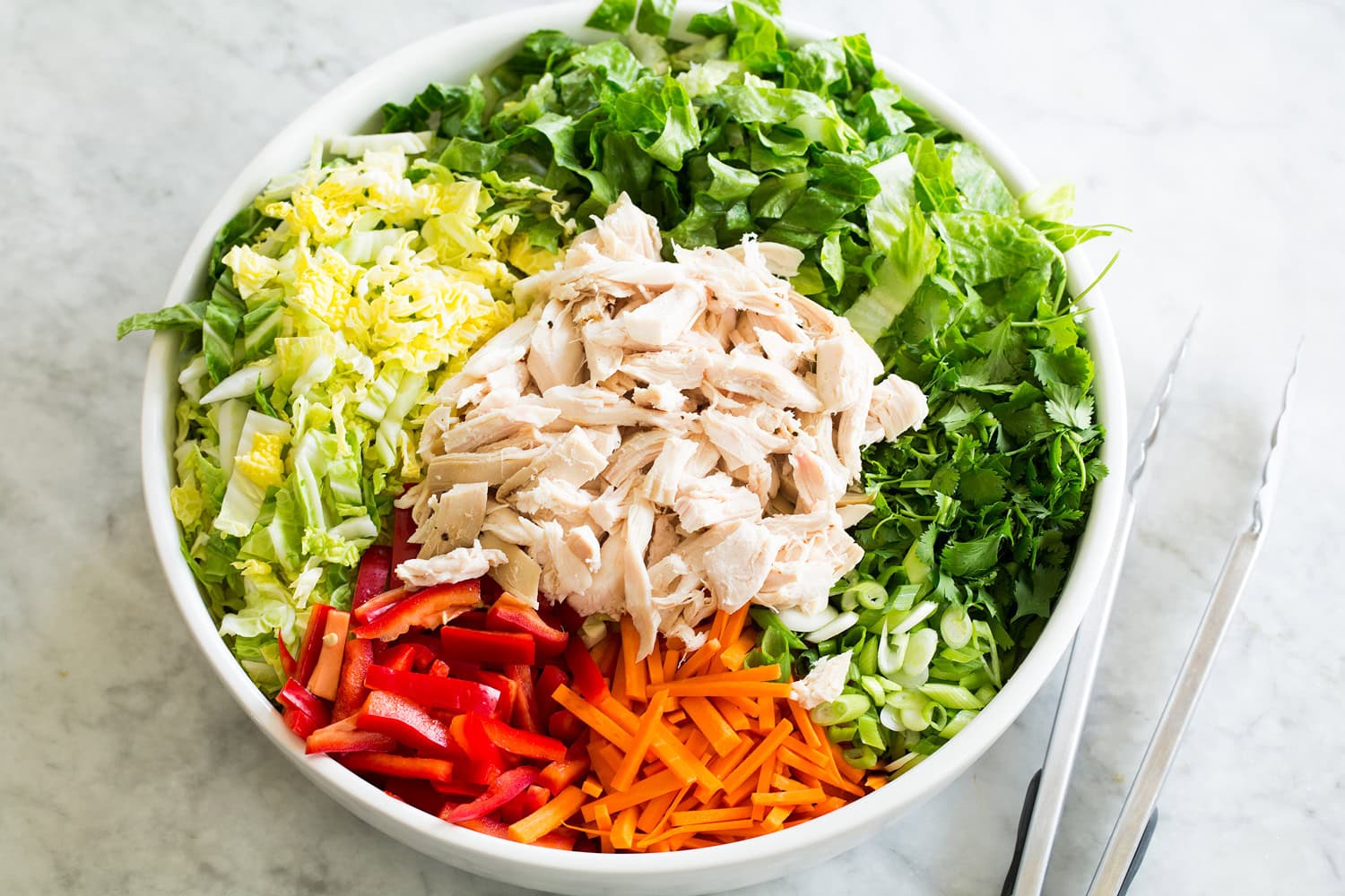 Chinese chicken salad ingredients shown before tossing.