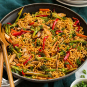 Stir fry noodles with bell peppers, carrots, broccoli, mushrooms and chicken. - 1