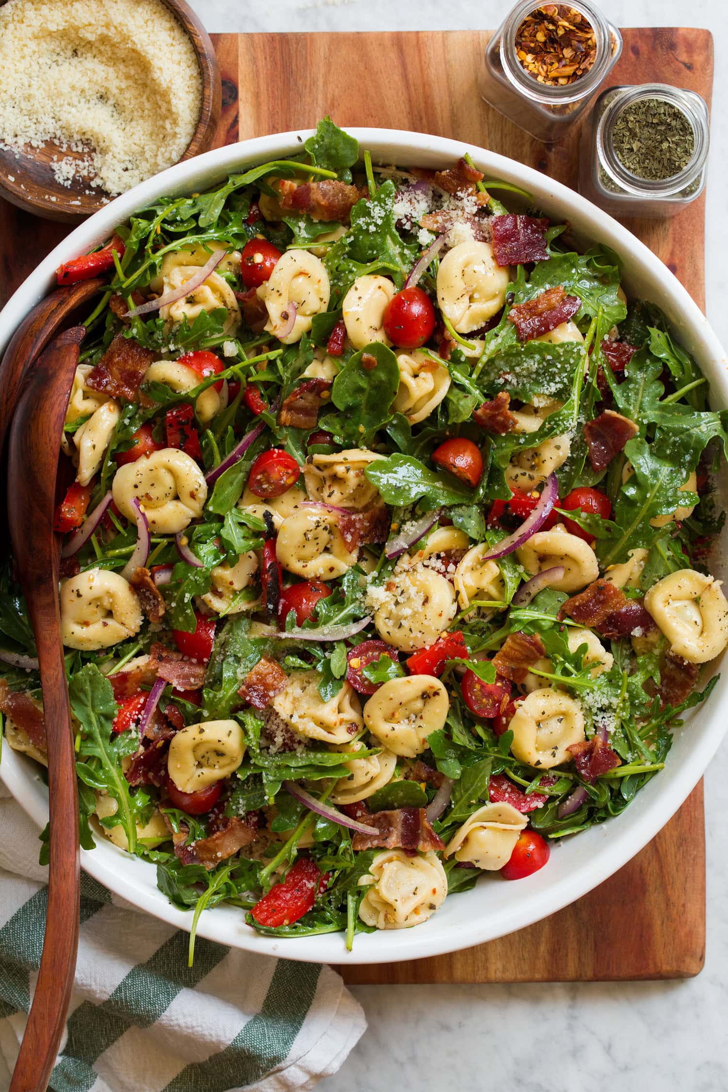 Tortellini, arugula, bacon, tomato, bell pepper salad.