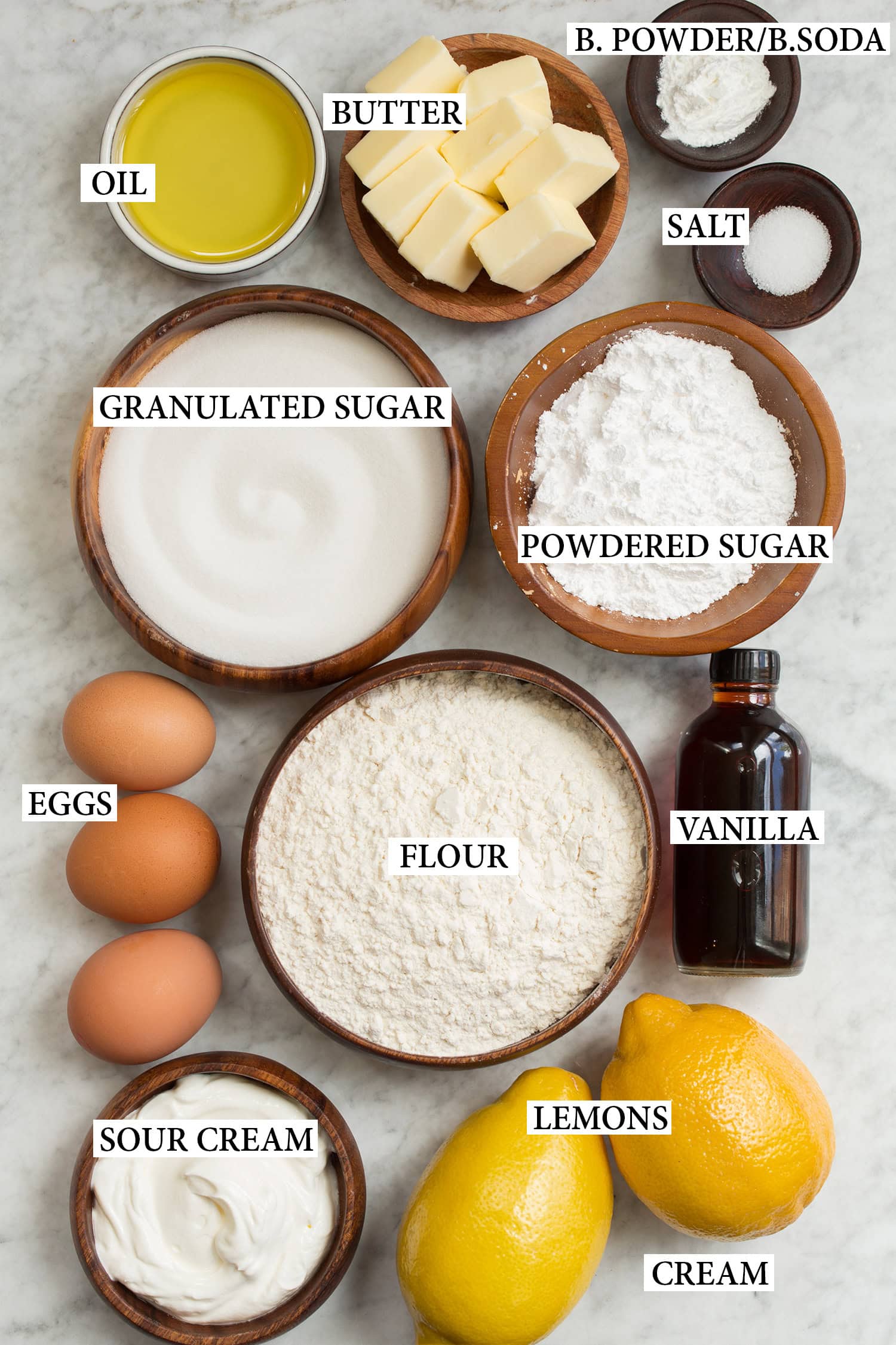 Ingredientai, naudojami citrininiam pyragui gaminti.