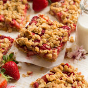 Close up photo of stacked strawberry oatmeal breakfast bars.