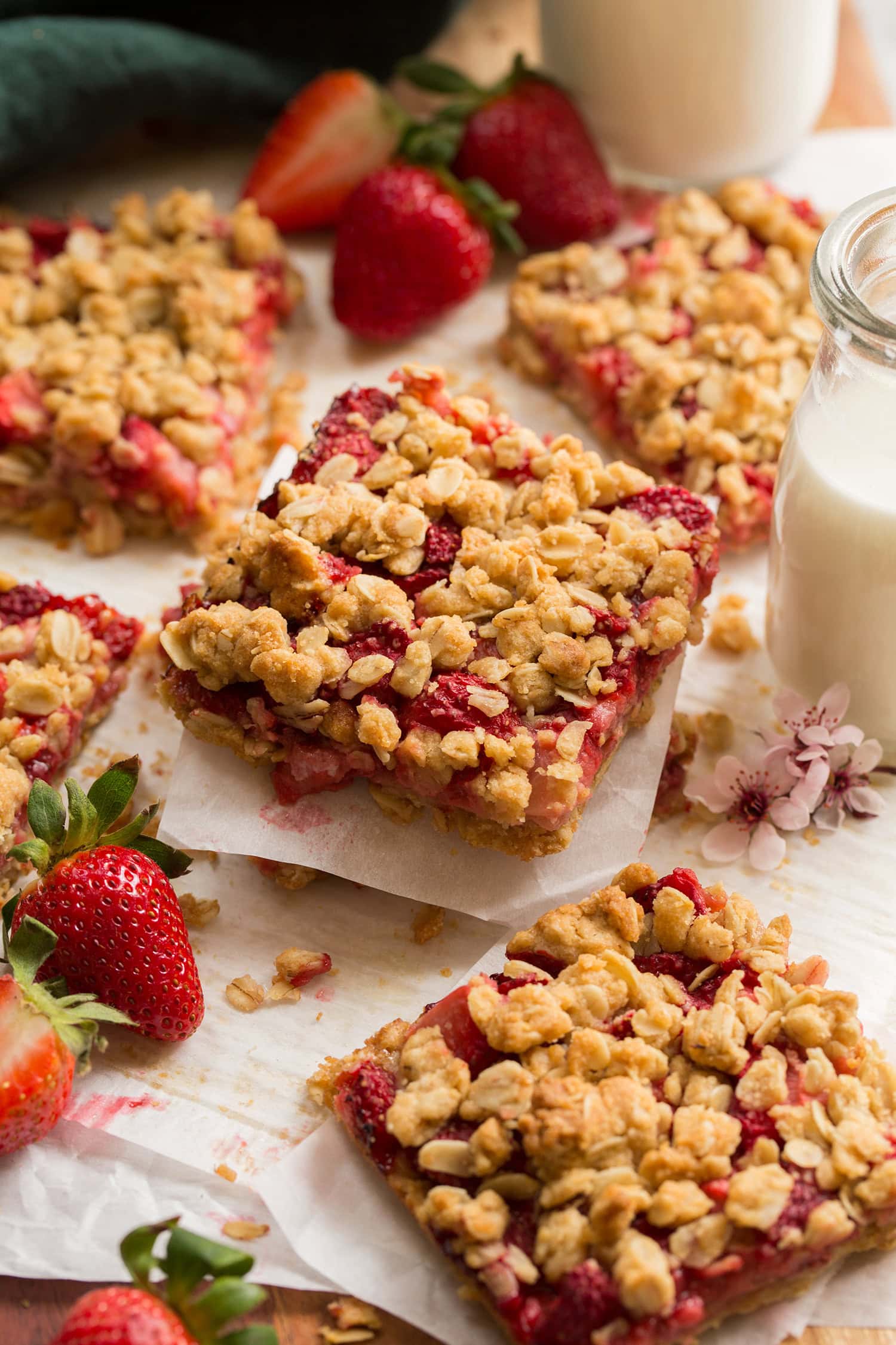 Close up photo of stacked strawberry oatmeal breakfast bars.