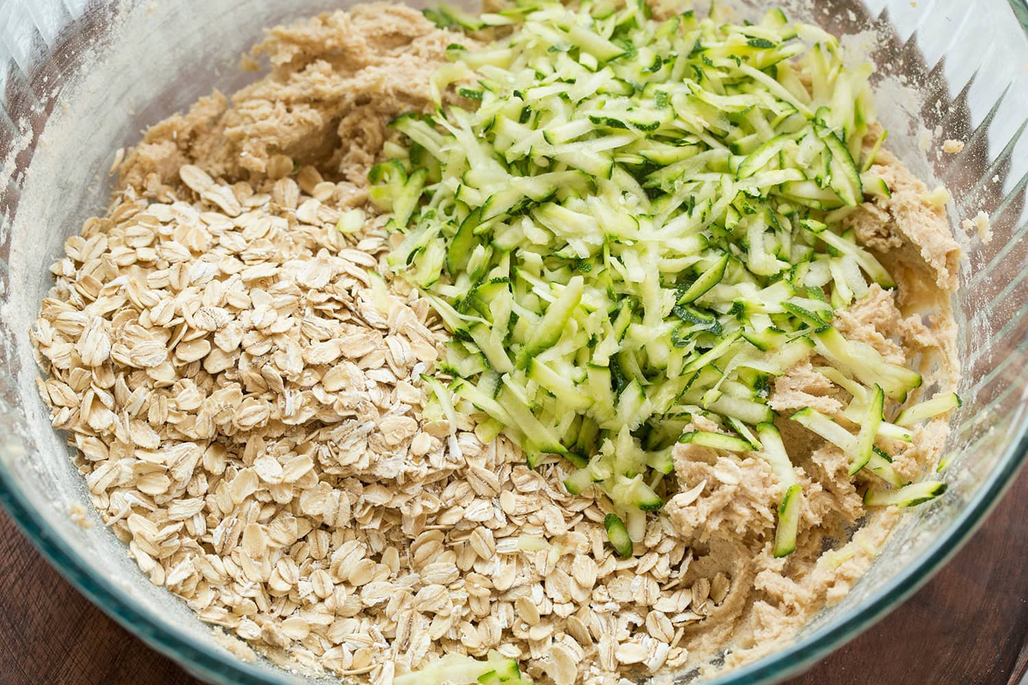 Shredded fresh zucchini and rolled oats added to cookie dough mixture.